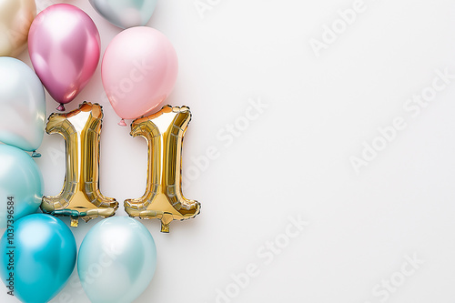 Gold number 11 balloons with pastel pink and blue balloons for eleventh birthday party celebration, event decoration, or festive party design with a simple and elegant style
