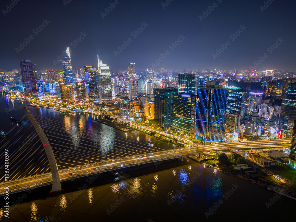 Fototapeta premium Aerial View of Ho Chi Minh City Skyline at Night, Vietnam