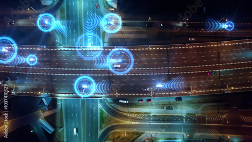 Aerial view of smart cars and transportation of the future. Automated robotic system remotely controls self-driving cars in the city. Artificial Intelligence Digitalizes and Analyzes Roads. 