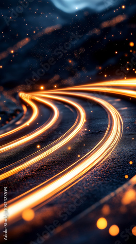 Golden Light Trails on Winding Road in Motion photo