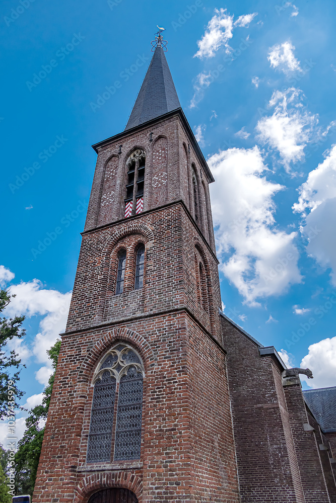 Fototapeta premium Slotkapel Kasteel (Castle chapel) in historic Castle De Haar (Kasteel de Haar, 1892) near Utrecht. Chapel features elaborate stonework and exquisite stained-glass windows. Haarzuilens, the Netherlands