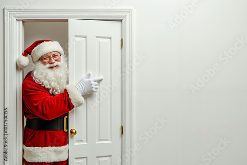 A man dressed as Santa Claus standing in front of a white door photo