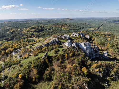 Aerial drone view of Zborow Hill, Poland. Limestone rock formation at peak of Gora Zborow, Podlesice, Poland. Krakow-Czestochowa Upland. Polish Jurassic Highland Mountainl Zborow in autumn.