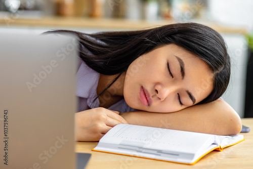 Tired Student or an office worker Sleeping at Desk Resting