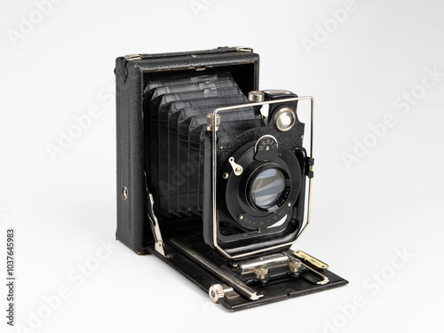 920s Vintage Analog Bellows Camera Isolated on White Background in Close-Up