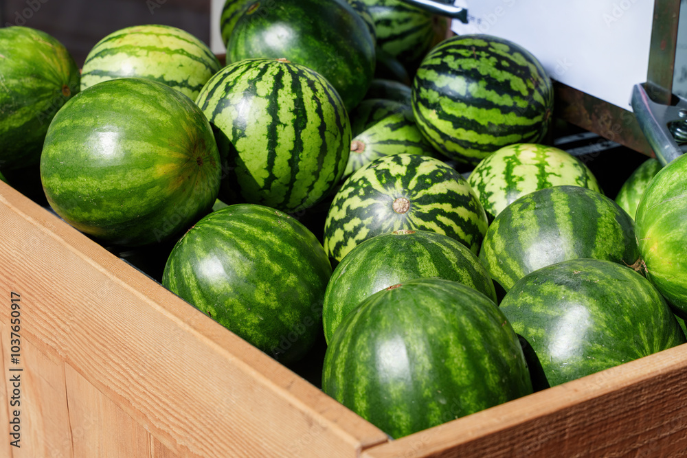 Watermelons Stacked In A Wooden Crate At Market Watermelons Stacked In A Wooden Crate At Market