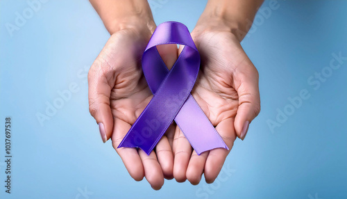 hands holding a purple ribbon