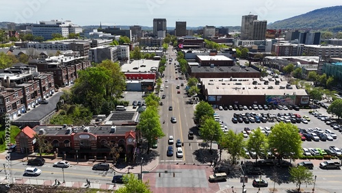 The downtown Chattanooga landscape extending to the mountains showcased from a drone angle