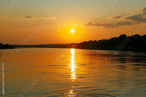 Sunset at the river coast. Sunset on the beach of the Baltic Sea