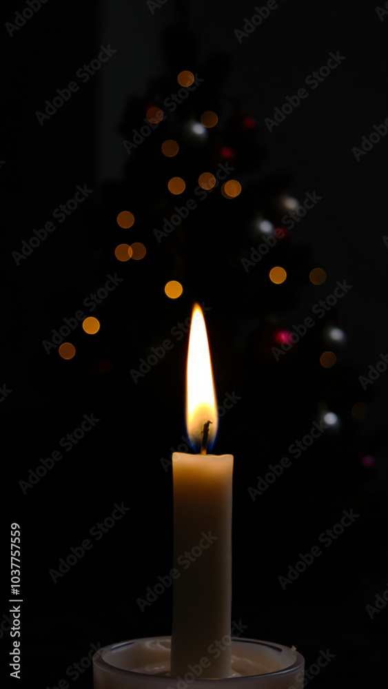 single candle glows the dark against a festive background single candle glows the dark against a festive background