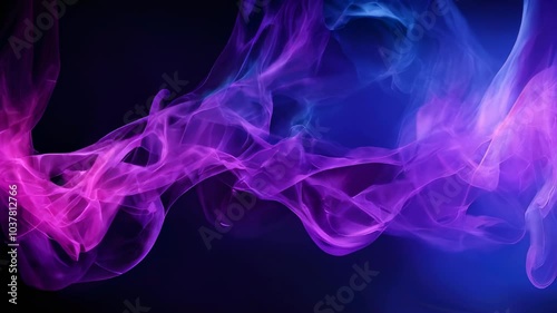 Delicate swirls of purple and blue smoke twist against a dark background, creating an ethereal and mysterious atmosphere.
