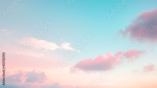 A serene early morning sky with soft pastel colors of pink and blue, just before sunrise