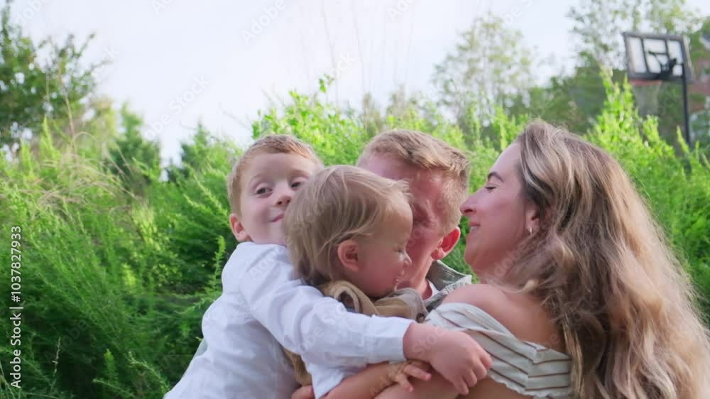 A family shares joyful moments in a beautiful park filled with love A family shares joyful moments in a beautiful park filled with love