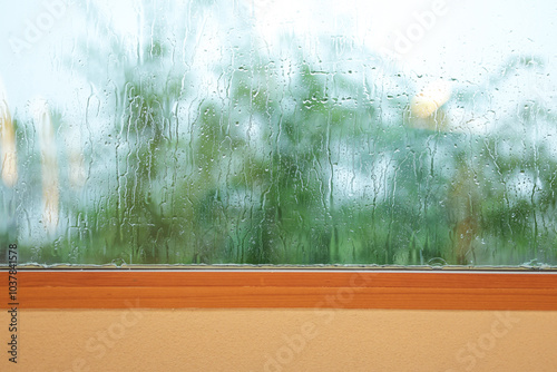 Fotografia Rainwater on the window glass