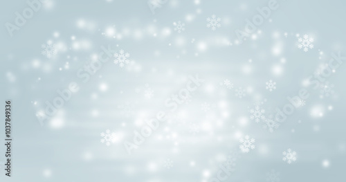 Blurred glitter effects background. Bright soft blue with hints of pearl color. Christmas background. Festive Christmas backdrop with holiday charm. Blurred bokeh light on dark blue background.