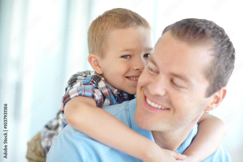 Happy, father and child hug in family home with fun, bonding and love in living room. Smile, play wrestling and youth with parent care, support and together with game, embrace and piggy back Happy, father and child hug in family home with fun, bonding and love in living room. Smile, play wrestling and youth with parent care, support and together with game, embrace and piggy back