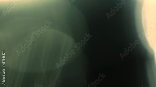 Slow motion real lens flare through glass effects for overlay or transition