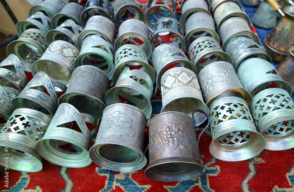 Rolls of intricated tea glass holders being sold in local market in Yerevan, Armenia Rolls of intricated tea glass holders being sold in local market in Yerevan, Armenia