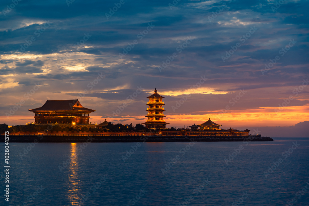Fototapeta premium The sunset scenery at night on the seaside of Penglai District, Yantai, Shandong, China