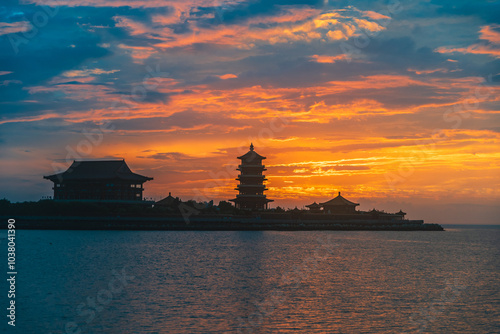 Sunset and sunset glow at the seaside, Penglai District, Yantai, Shandong, China photo