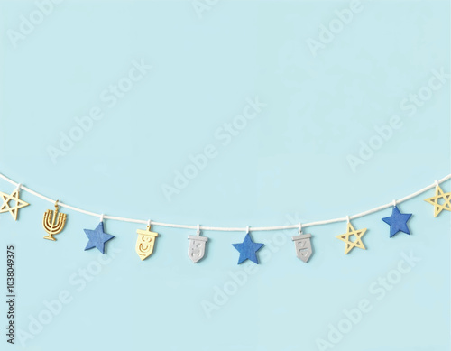 a Hanukkah garland with star of David icons and dreidels with menorah hanging from the strings