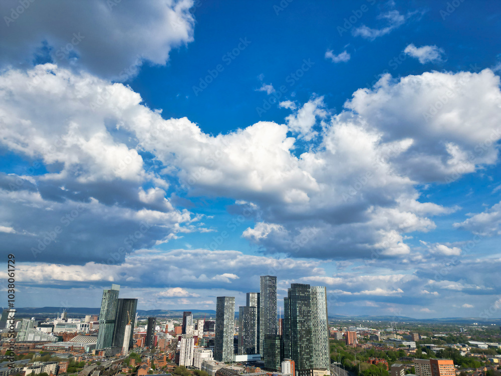 Aerial View of Greater Manchester City Centre and Tall Buildings During Golden Hour of Sunset. England UK. May 5th, 2024, High Angle Footage Was Captured with Drone's Camera Aerial View of Greater Manchester City Centre and Tall Buildings During Golden Hour of Sunset. England UK. May 5th, 2024, High Angle Footage Was Captured with Drone's Camera