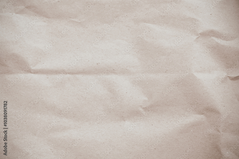 Crumpled brown paper texture background for design with copy space for text or image.	
