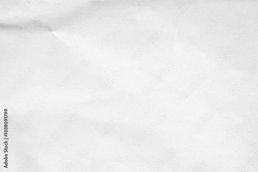 Crumpled white paper texture with a soft, wintery feel, perfect for backgrounds and design. Crumpled white paper texture with a soft, wintery feel, perfect for backgrounds and design.