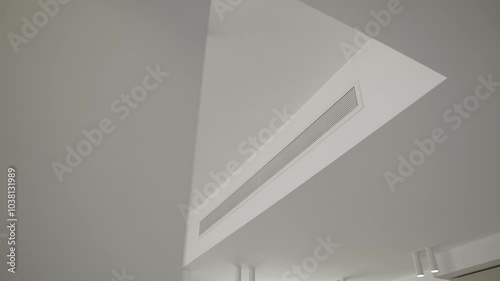 Supply ventilation system on white ceiling. Concept for modern ventilation technology, climate comfort control Interiors and solutions. Slow motion video with copy space.