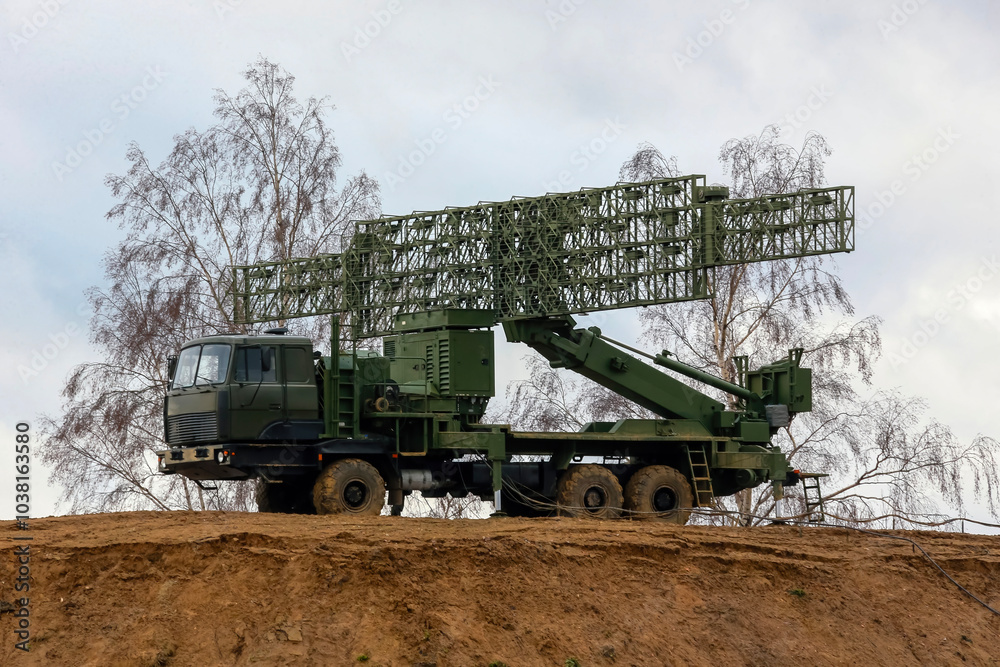 Fototapeta premium Military Radar Systems in a Cloudy Landscape