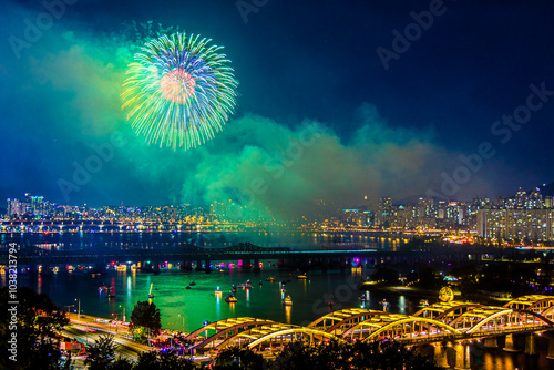 fireworks over the river in the city