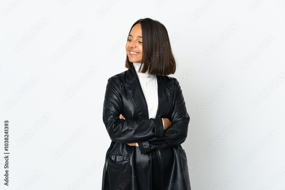 Young latin woman isolated on white background looking to the side and smiling Young latin woman isolated on white background looking to the side and smiling