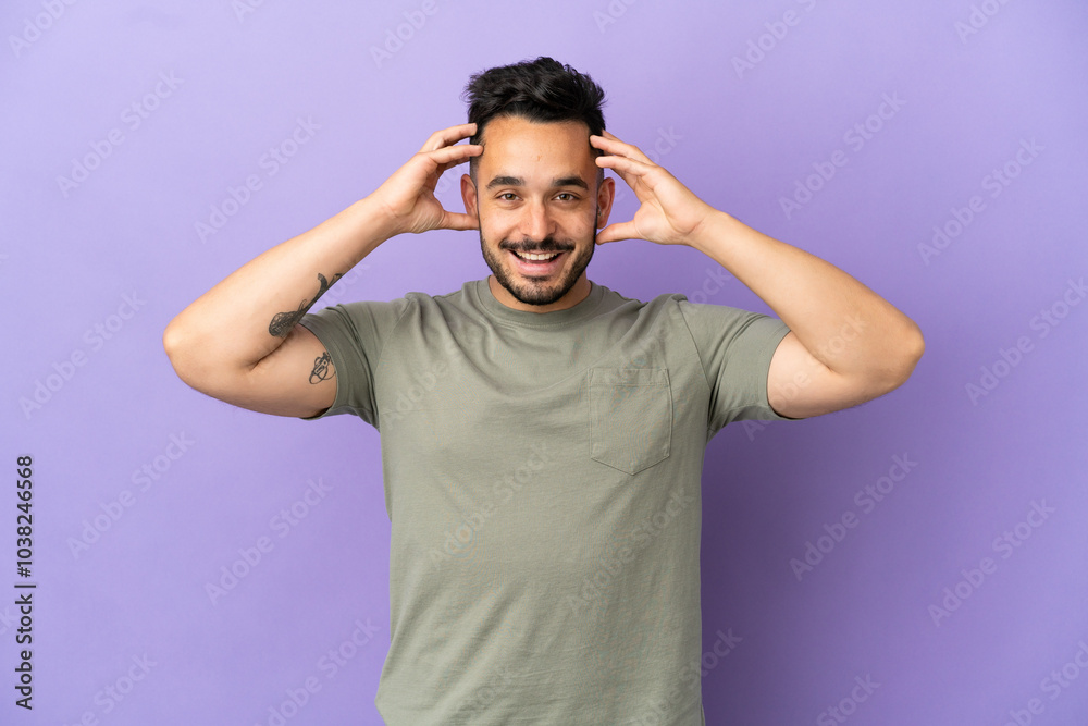 Young caucasian man isolated on purple background with surprise expression Young caucasian man isolated on purple background with surprise expression