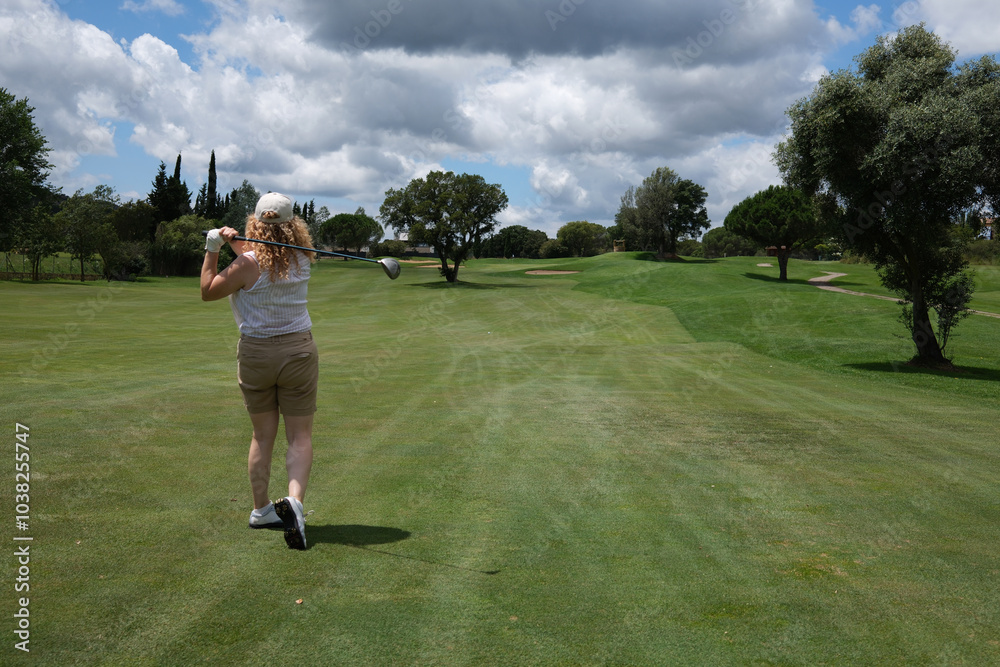 green golf course in a sunny day green golf course in a sunny day
