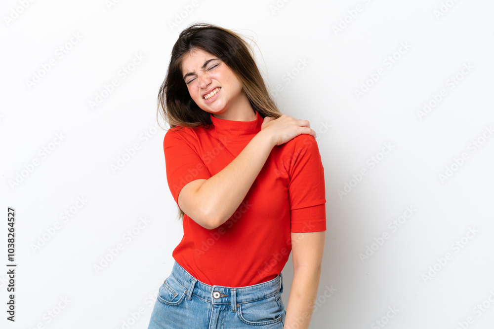 Young caucasian woman isolated on white background suffering from pain in shoulder for having made an effort Young caucasian woman isolated on white background suffering from pain in shoulder for having made an effort