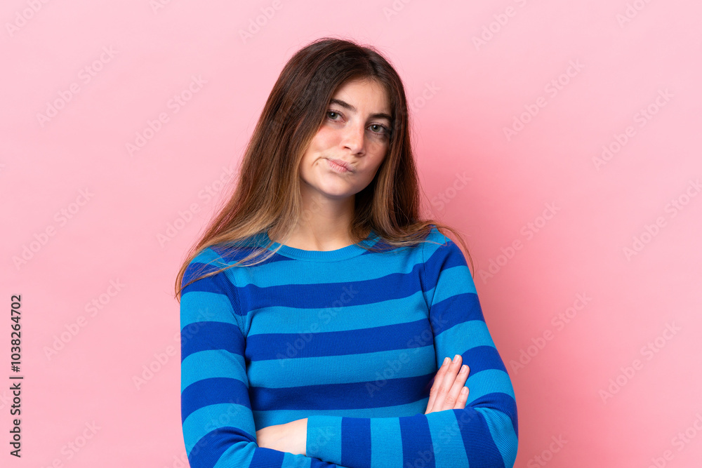 Young caucasian woman isolated on pink background with unhappy expression Young caucasian woman isolated on pink background with unhappy expression