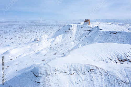 Aerial photography of snow scenery at the Fenghuo Pagoda Site in Jiuquan, Gansu, China photo