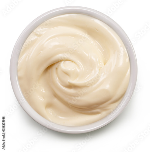 Homemade mayonnaise in white bowl on white background, top view. File contains clipping path.