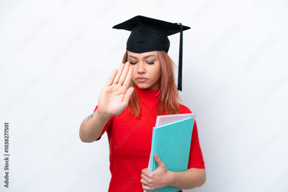 Young student Russian girl isolated on white background making stop gesture and disappointed Young student Russian girl isolated on white background making stop gesture and disappointed