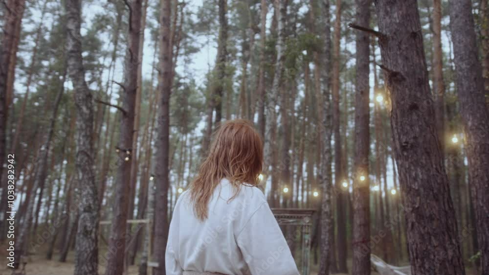 Young woman walks through natural forest. Active lifestyle. Young woman walks through natural forest. Active lifestyle.