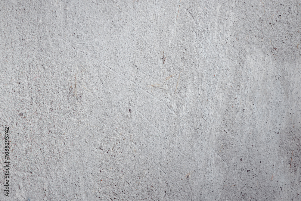 Plastered beige surface with cement material. Textured pattern with space for text. Texture of old gray concrete wall for background. Calm neutral spa background. 