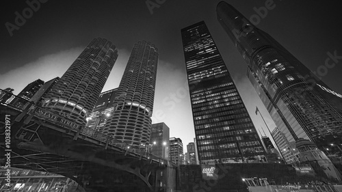 Chicago, IL - July 25, 2024: Amazing night view of Downtown Chicago skyscrapers from a cruise along the city river