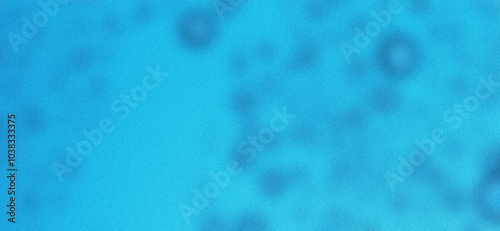 Blurred background of water drops on blue background with grainy texture