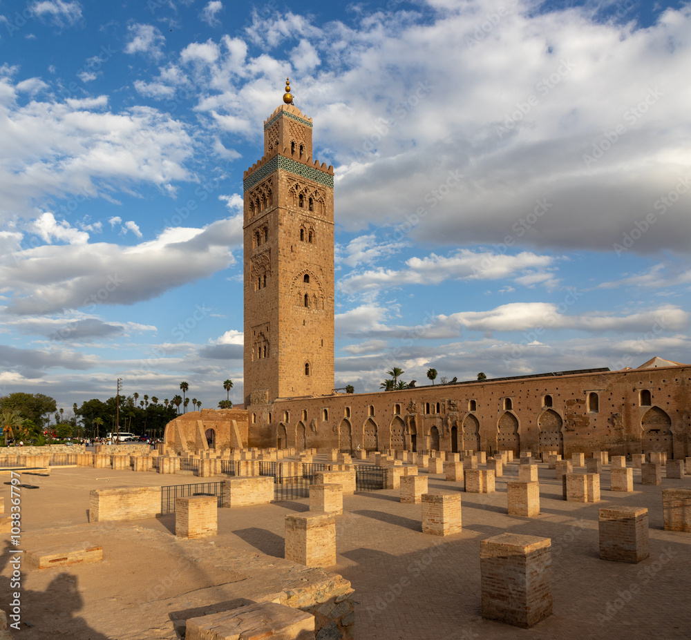 Fototapeta premium The Koutoubia Mosque Minaret in Marrakech, Morocco, is the largest and most iconic mosque in the city, known for its stunning architecture.