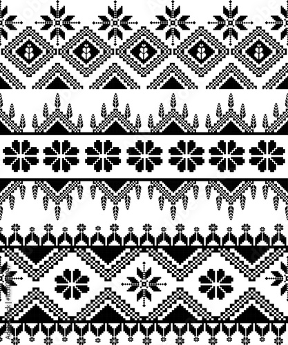 Traditional black and white folk art pattern with geometric shapes and floral elements, ideal for textiles, embroidery, or cultural designs.