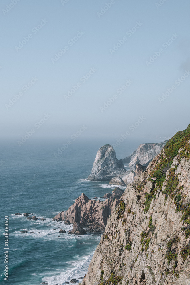 waves and rocks, cliff, sunlight through clouds waves and rocks, cliff, sunlight through clouds