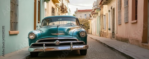 A green vintage car is parked on a charming, narrow street lined with pastel-colored buildings, evoking a nostalgic, retro atmosphere in an urban setting.