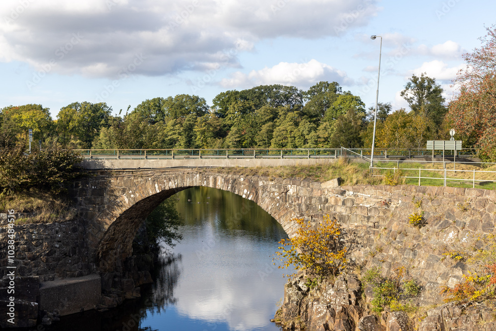 Stone arch bridge at Laholm old power plant in Sweden Stone arch bridge at Laholm old power plant in Sweden