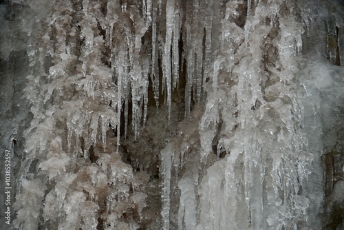 icicles on the rock wall in switzerland