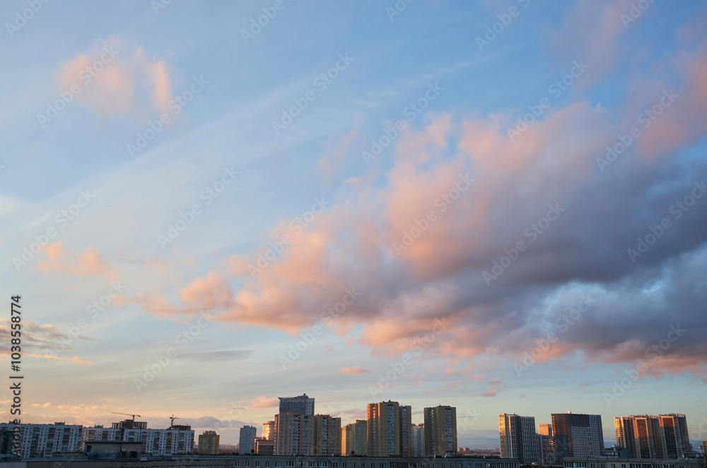 Fototapeta premium Colorful Sunset Sky with Clouds Over City